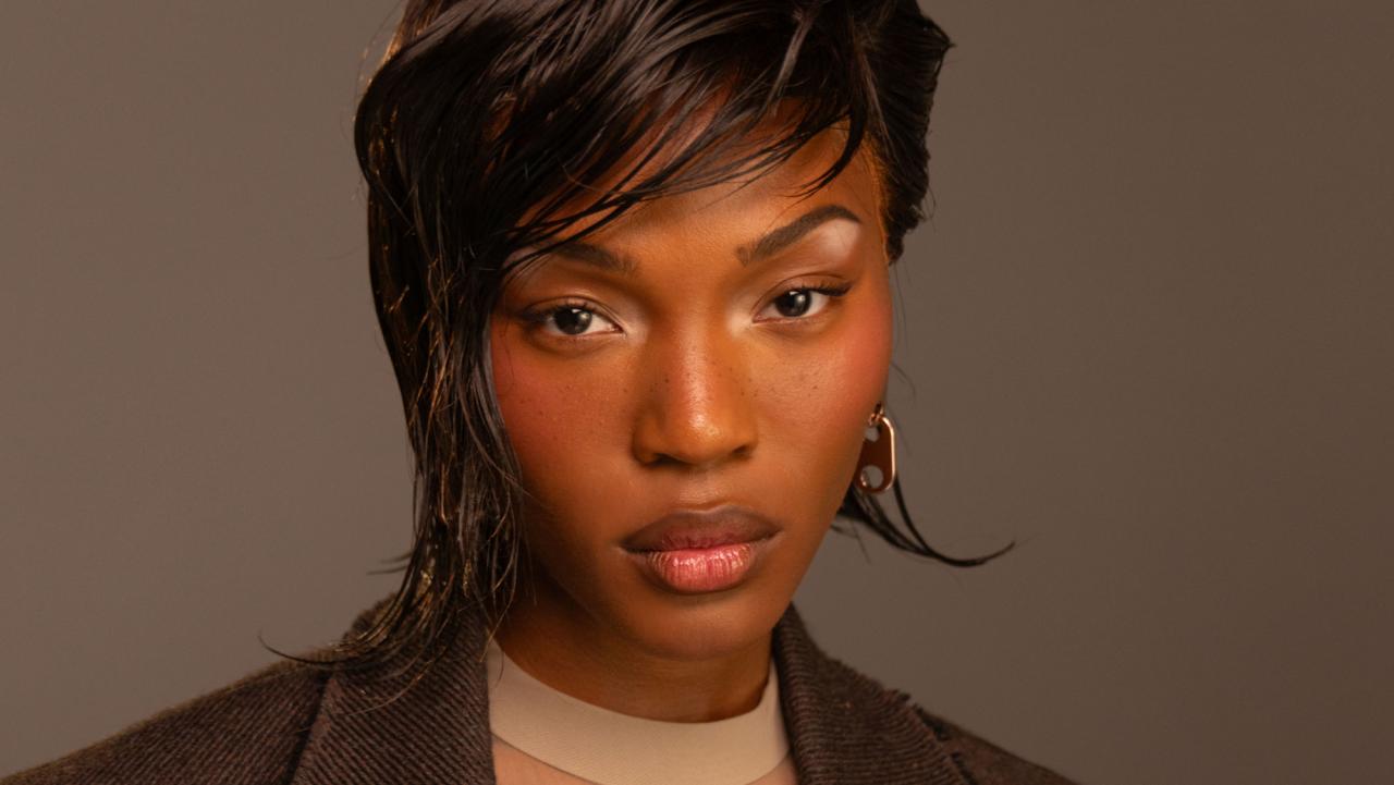 Quenlin Blackwell posing confidently